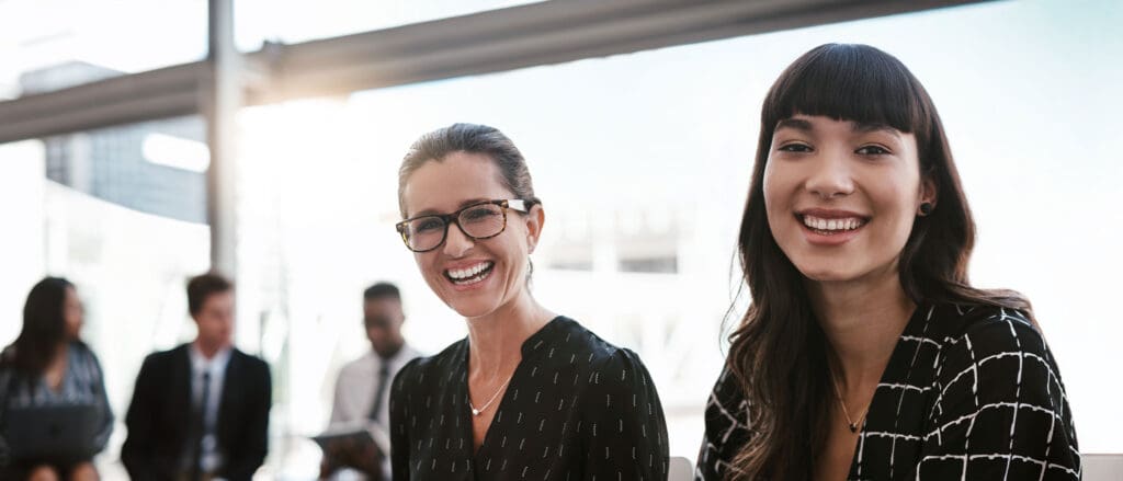 Two Women laughing/smiling