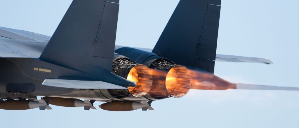 Jet engines shooting out flames