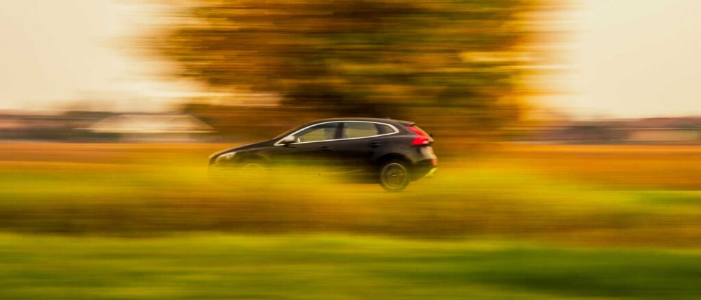 Car driving with blurred surroundings