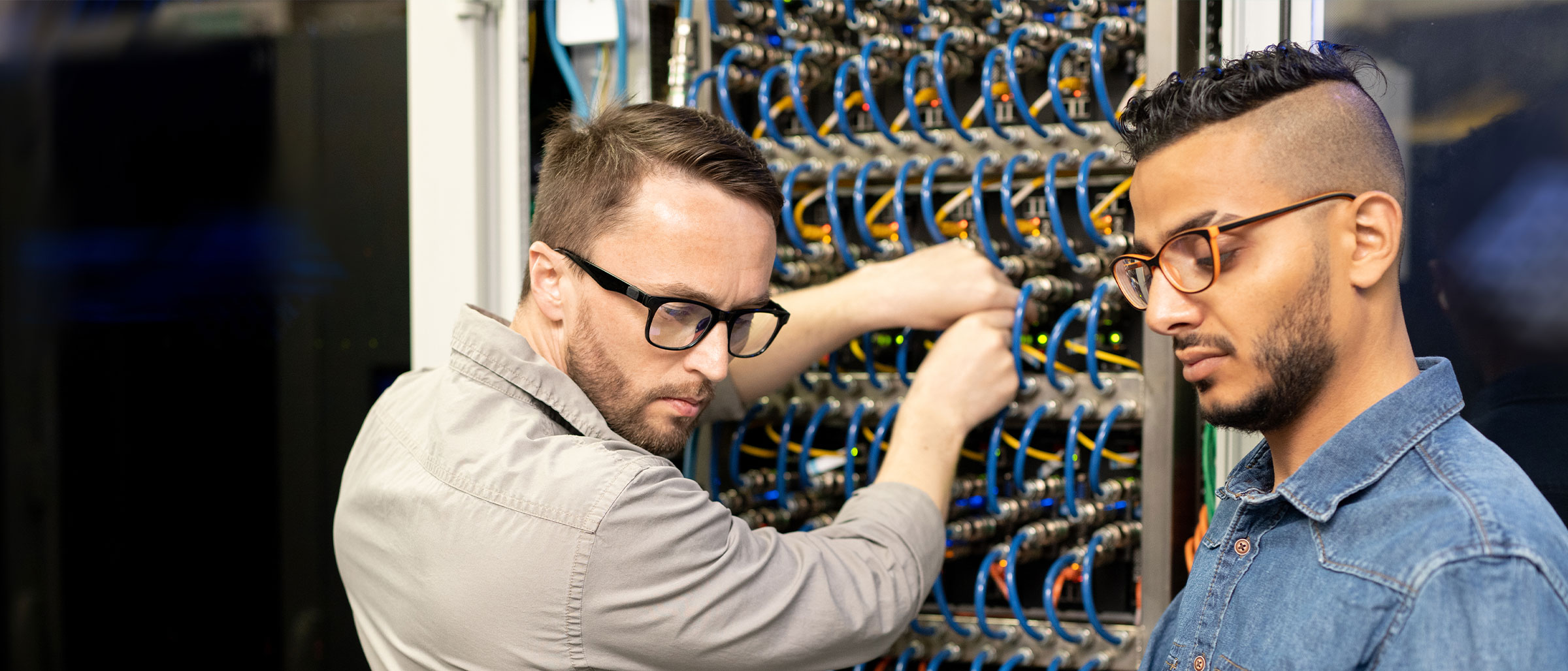 Two men in a server room