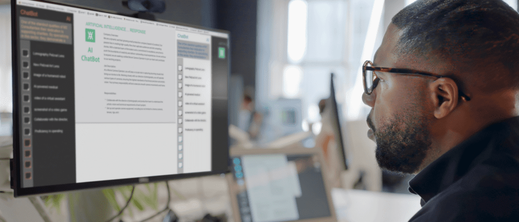 Man looking at AI chatbot on computer screen